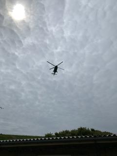 The helicopter, taking regular trips back and forth to Lundy, from Hartland Point